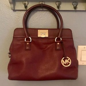 Michael Kors maroon leather bag with long strap